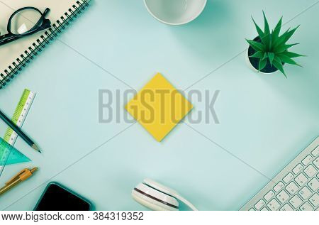 Yellow Stick Note Or Note Pad And Office Supplies As Keyboard,pen,pencil,office Plants,notebook,glas