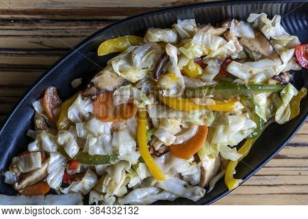Healthy Snack Of Assorted Farm Fresh Roast Vegetables And Mushroms In A Plate On A Rustic Table, Clo