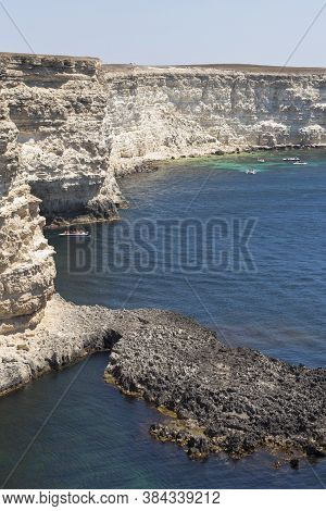 Tourists On Boats Inspect The Yogi Bay Of The Tarkhankut Peninsula, Crimea, Russia