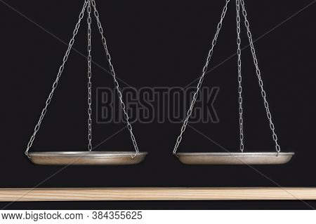 Scales Are In Balance. Black Background And Wooden Shelf. Balance Concept. Front View. Copy Space