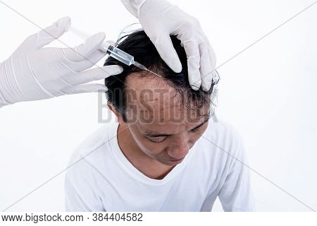 Top View Images Of A Man Receiving Treatment With Injections Serum On Skin Around The Head, In Which