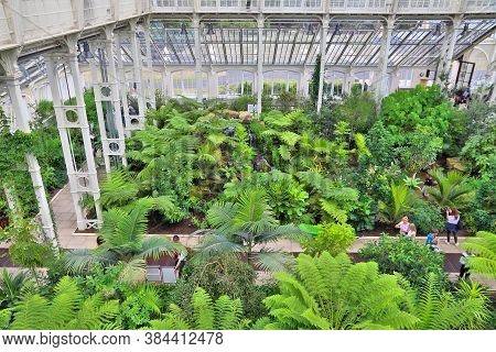 Kew, Uk - July 15, 2019: People Visit Temperate House Of Kew Gardens In Greater London. Royal Botani