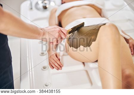 Thick Layer Of Body Scrub For The Young Client Of Beauty Clinic