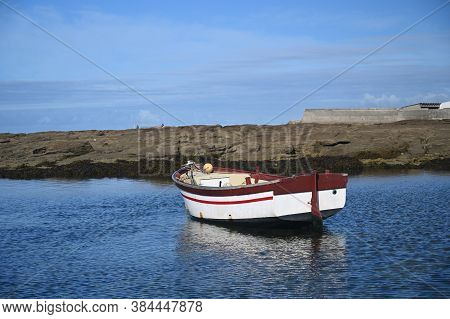Small Fishing Boat In A Bay. Guilvinec, French Brittany