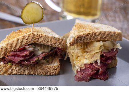 Reuben Sandwich On A Plate With Fries