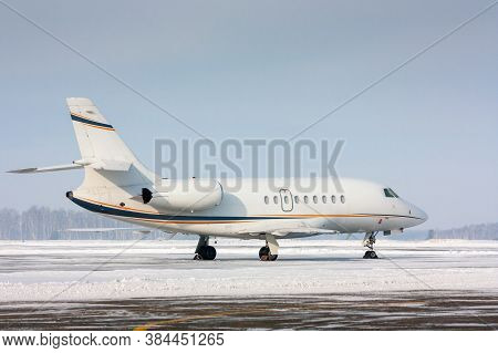 White Private Plane In A Cold Winter Airport