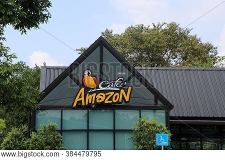 Muang, Pathum Thani, Thailand - Oct 7, 2019 : Logo Of Cafe Amazon Coffee Shop With Nature Environmen