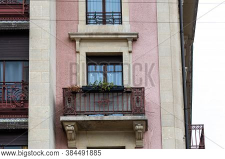 Facade Of A Historic Brick Building With Metal Balconies. Geneva, Switzerland - Image