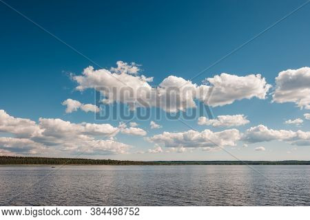 Vuoksa River Near Imatra In The Leningrad Region, Russia. Coastline With Pine Forest Reflected In Vu