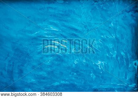 Blue Water Texture As Abstract Background, Swimming Pool And Waves Design