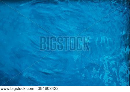 Blue Water Texture As Abstract Background, Swimming Pool And Waves Design