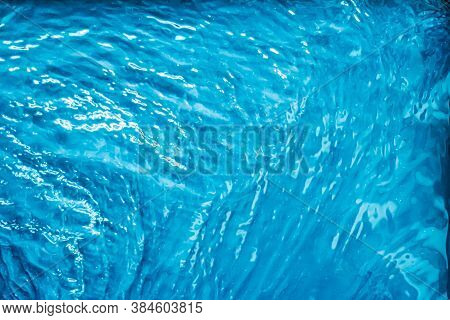 Blue Water Texture As Abstract Background, Swimming Pool And Waves Design