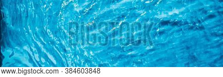 Blue Water Texture As Abstract Background, Swimming Pool And Waves Design
