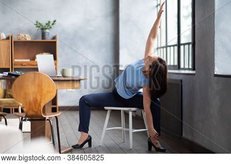 Caucasian Girl Workout Doing Goddess Pose Temple Or Sumo Pose, Stupasana
