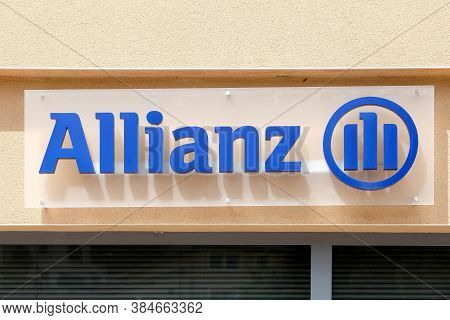 Tarare, France - June 27, 2020: Allianz sign on a wall. Allianz is a European financial services company headquartered in Munich, Germany