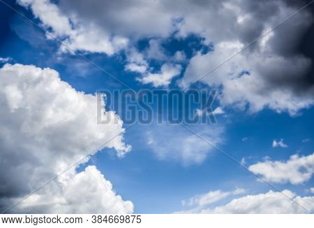 Beautiful Combination Of White And Dark Clouds In A Blue Sky