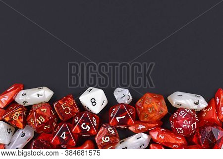 Background With Different Roleplaying Rpg Dice At Bottom Of Dark Black Background With Blank Copy Sp