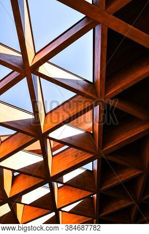 Roofing Construction. Wooden Roof Frame House Construction. Abstract Structure Background. Wood Text