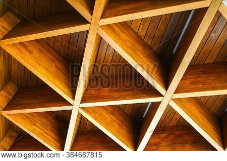 Roofing Construction. Wooden Roof Frame House Construction. Abstract Structure Background. Wood Text