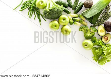 Greeny Cocktail Ingredients. Background. Сucumber, Avocado, Broccoli, Beans, Leek And Fresh Apple On