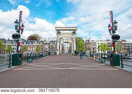 City scenic from Amsterdam with the Tiny bridge in the Netherlands