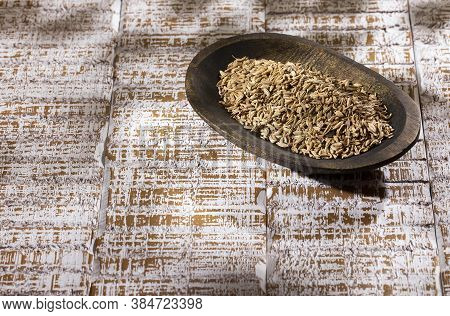 Fennel Seeds In A Wooden Bowl - Foeniculum Vulgare
