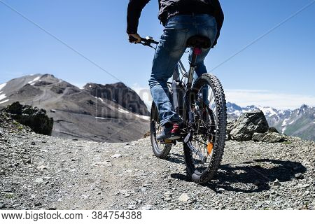 Man Riding Electric Mountain Bike Or E Bike In Alps