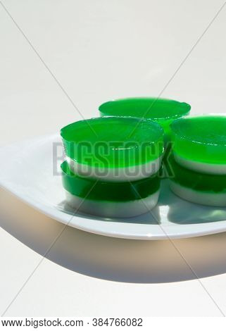 Two-layer Jelly Made From Pandanus Leaves And Coconut Milk. Traditional Thai Street Food. Lao Wun. M