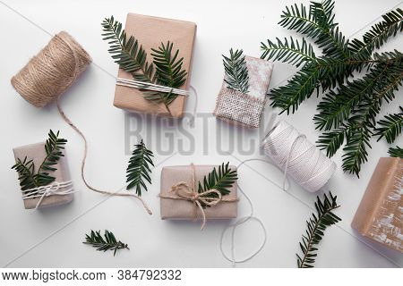 Hand Made Gifts For Christmas On White Table