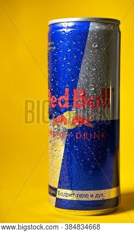 Sankt-petersburg, Russia - September 09, 2020: Aluminum Can Of Redbull Drink With Water Drops Over Y