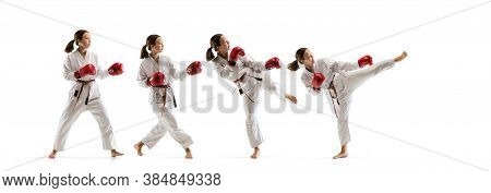 Aspiration. Junior In Kimono Practicing Taekwondo Combat, Martial Arts. Young Female Fighter With Re