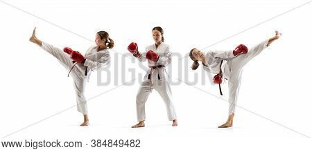 Team. Junior In Kimono Practicing Taekwondo Combat, Martial Arts. Young Female Fighter With Red Glov
