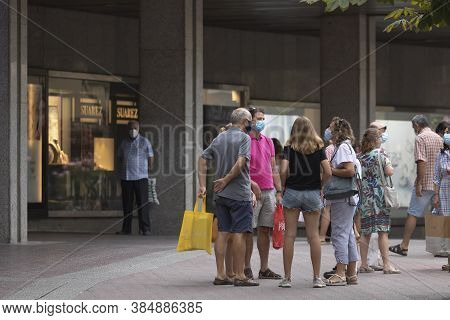 Zaragoza, Spain - August 18, 2020: Group Of People Talking With Face Masks, Due To The Coronavirus P