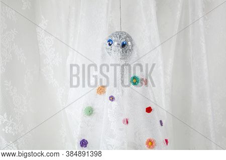 Ghost In Lace Curtain With Flowers