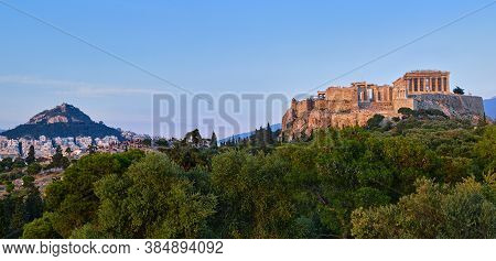 View Of Acropolis Hill And Lycabettus Hill In Background In Athens, Greece From Pnyx Hill In Soft Su