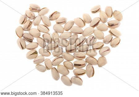 Pistachios In White Porcelain Bowls. Roasted Pistachio Seeds In Shells And Shelled. Green, Dried Fru