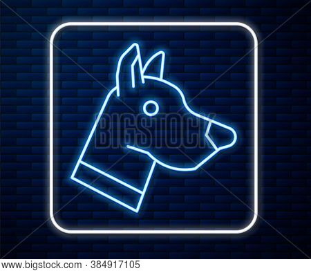 Glowing Neon Line Dog Head Icon Isolated On Brick Wall Background. Vector