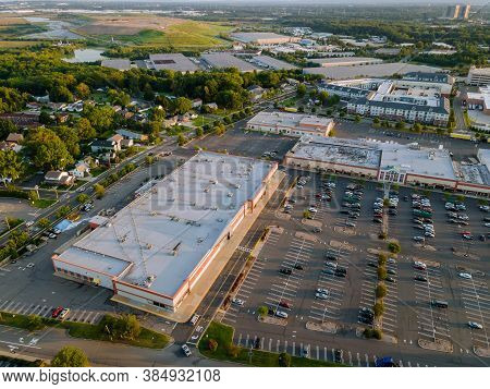 Aerial View Shopping Mall Of Goods Exterior View With Of Parking Lot Space