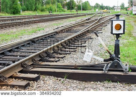Adjustable Arrow On A Fork Of The Railways. Arrow For Switching The Railway With Rail Track Elements