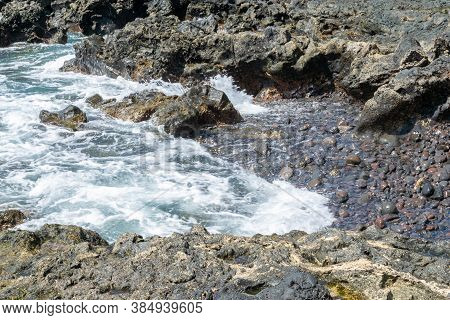 Beautiful Landscape Of Lanzarote Where The Sea Caresses The Coast Of Volcanic Stones, Canary Islands