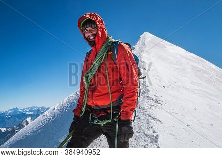 Last Steps Before Mont Blanc (monte Bianco) Summit 4,808 M Of Man With Climbing Axe Dressed Mountain