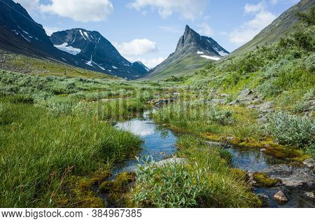 Swedish Lapland landscape. Nallo mountain in northern Sweden. Arctic environment of Scandinavia in summer day