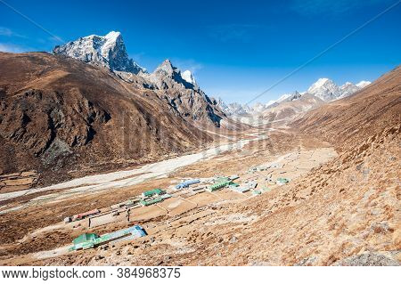 Aerial View Of Dingboche Village (4410 M) And Tawoche/taboche Peak. Trekking In Nepal Himalayas. Ebc