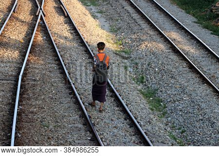 Yangon, Myanmar, Feb 20, 2019 : Back Side Of Myanmese Man In Short Sleeve T Shirt With Backpack And 
