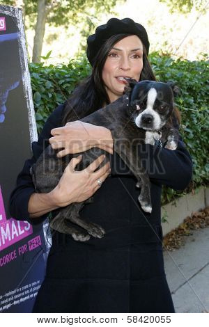 HOLLYWOOD - DECEMBER 19: Famke Janssen at the press conference for PETA, Runyon Canyon Park December 19, 2006 in Hollywood, CA