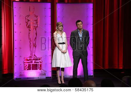 Emma Stone and Seth McFarlane at the 85th Academy Awards Nominations Announcement, AMPAS Samuel Goldwyn Theater, Beverly Hills, CA 01-10-13