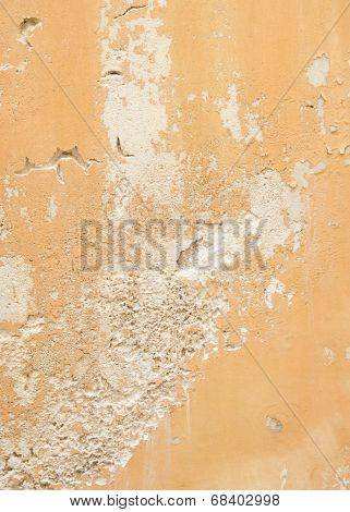 Old cracked yellow wall