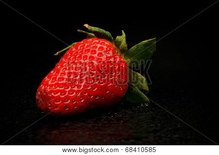 Frech Strawberries With Leaves On Black Background