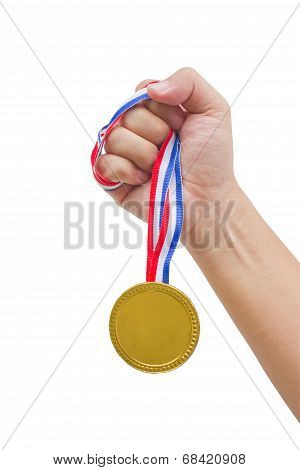 Golden Medal In Man's Hand Isolated On White Background.