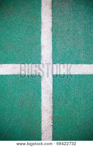 Fake Grass And White Line As Background.